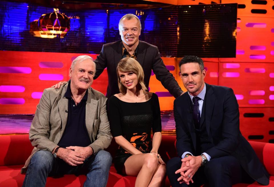 Cleese, alongside Taylor Swift and Kevin Pietersen, on the Graham Norton show in 2014 when he last appeared (PA)