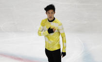 United States' Nathan Chen reacts after competing in the men's free skating during the figure skating Grand Prix finals at the Palavela ice arena, in Turin, Italy, Saturday, Dec. 7, 2019. (AP Photo/Antonio Calanni)