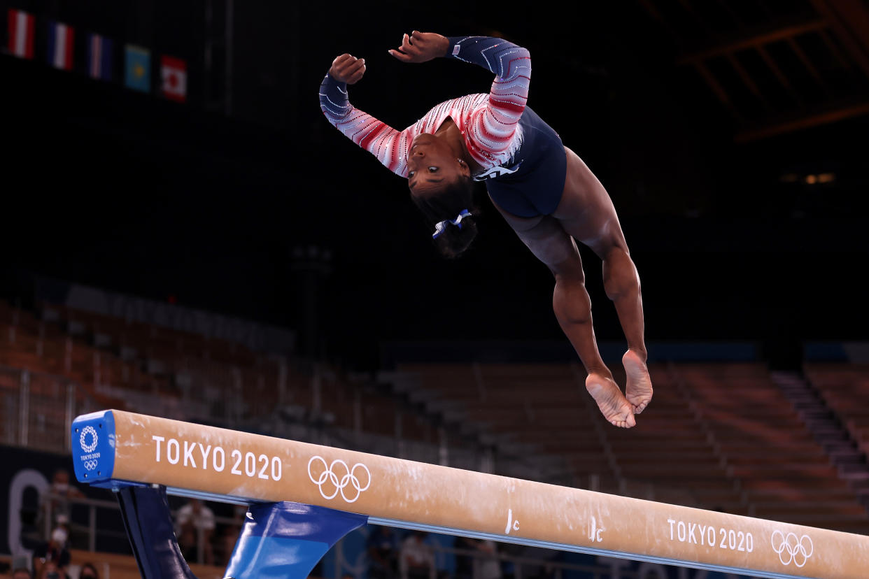 Simone Biles of the United States competes in the women's balance beam final at the 2020 Tokyo Olympics.