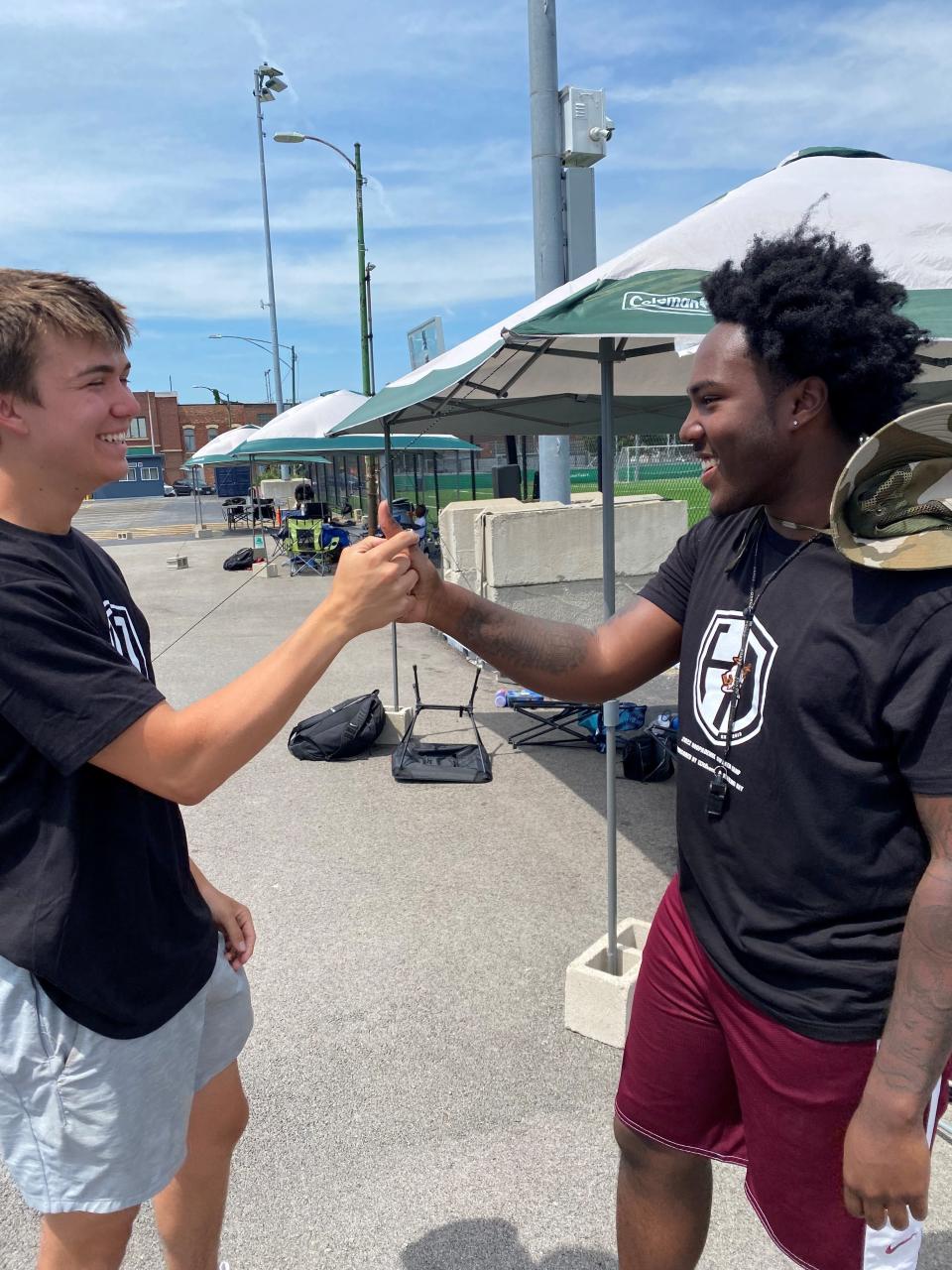 Christian Michaels, a Southern Methodist University student, and Terry Gordon, a Marquette University student, return to Chicago in the summer to help coach and mentor youth.