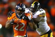 FILE PHOTO: Jan 17, 2016; Denver, CO, USA; Denver Broncos running back C.J. Anderson (22) runs against Pittsburgh Steelers inside linebacker Lawrence Timmons (94) during the fourth quarter of the AFC Divisional round playoff game at Sports Authority Field at Mile High. Mandatory Credit: Mark J. Rebilas-USA TODAY Sports / Reuters Picture Supplied by Action Images (TAGS: Sport American Football NFL) *** Local Caption *** 2016-01-18T012105Z_1793754250_NOCID_RTRMADP_3_NFL-AFC-DIVISIONAL-PITTSBURGH-STEELERS-AT-DENVER-BRONCOS.JPG