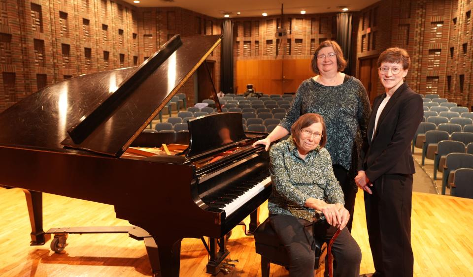 Jan 12, 2024; Bexley, Ohio, USA; As it ends operations after 141 years, three leaders of Women in Music-Columbus reflect on the group. From left is Phyllis Byard (seated), Cynthia Mahaney, and Karen Gardener at the Huntington Recital Hall at Capital University, where the group staged many performances.