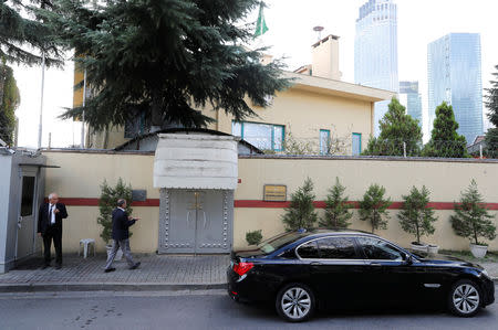 An official walks to gate of Saudi Arabia's consulate in Istanbul, Turkey, October 10, 2018. REUTERS/Osman Orsal