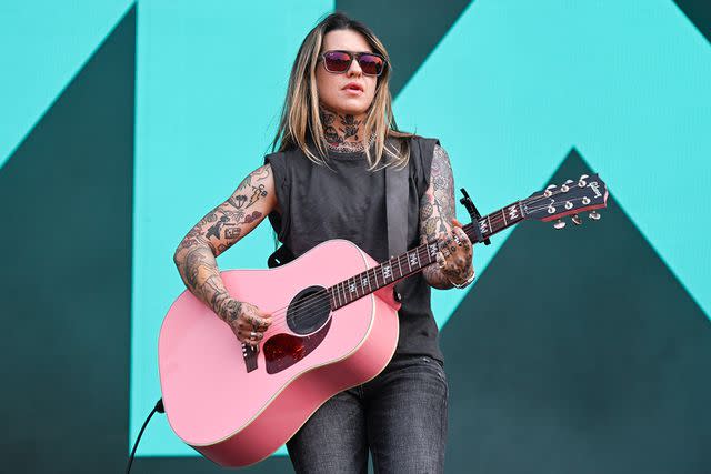 <p>Astrida Valigorsky/Getty </p> Morgan Wade performs at the Bonnaroo music festival in June.