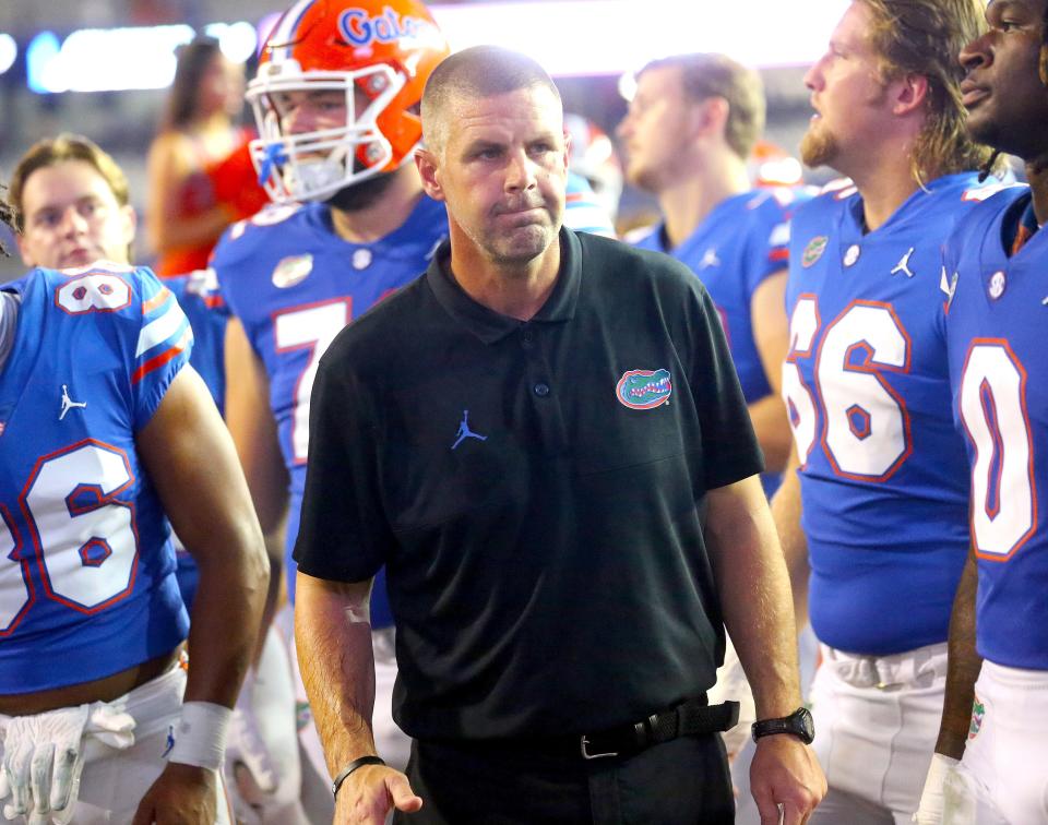 Florida Gators head coach Billy Napier sings with his team after losing to Kentucky at Ben Hill Griffin Stadium at Steve Spurrier-Florida Field, in Gainesville FL, Sept. 10, 2022.
