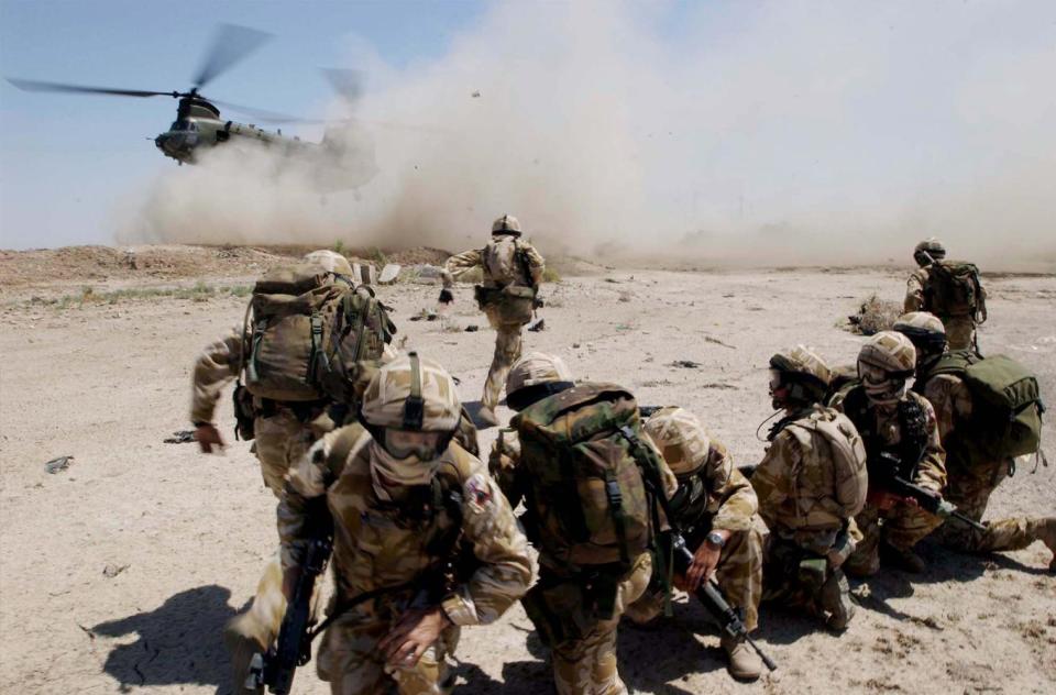 <p>British soldiers in Basra in 2004</p> (Giles Penfound/British Army via Getty)