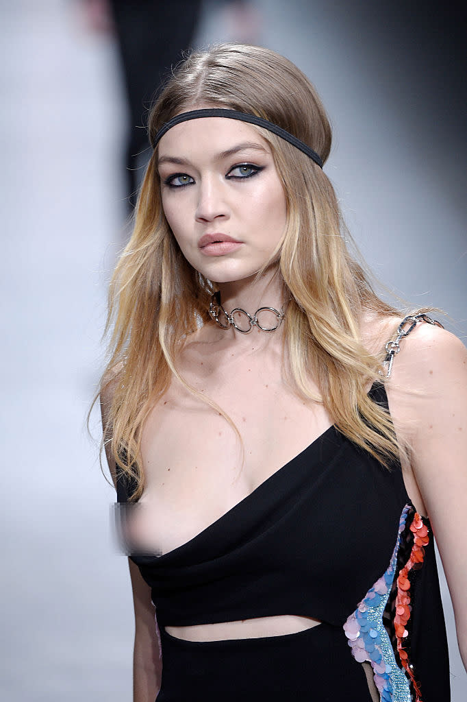 Gigi Hadid suffered the ultimate wardrobe mishap on the Versace catwalk at Milan Fashion Week in 2016. (Getty Images)