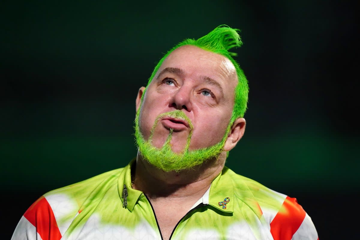 Upset: Peter Wright averaged less than 84 on a woeful night at Ally Pally (PA)