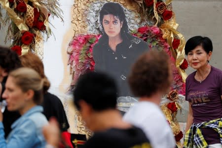 Fans gather at Forest Lawn Cemetery ten years after the death of child star turned King of Pop, Michael Jackson, in Glendale, California