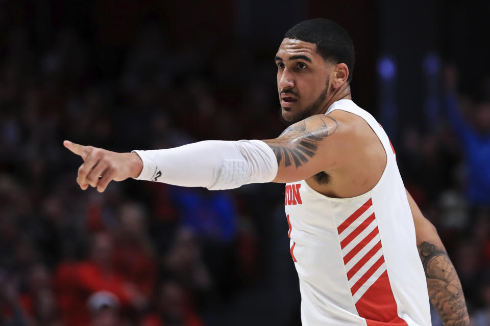 Dayton's Obi Toppin (1) reacts to teammates in the first half of an NCAA college basketball game against Duquesne, Saturday, Feb. 22, 2020, in Dayton, Ohio. (AP Photo/Aaron Doster)