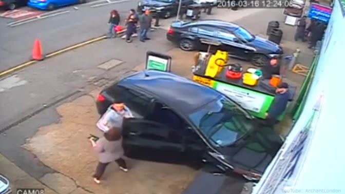 The punch knocked Ms Smith off her feet outside her shopfront in Essex. Photo: CCTV