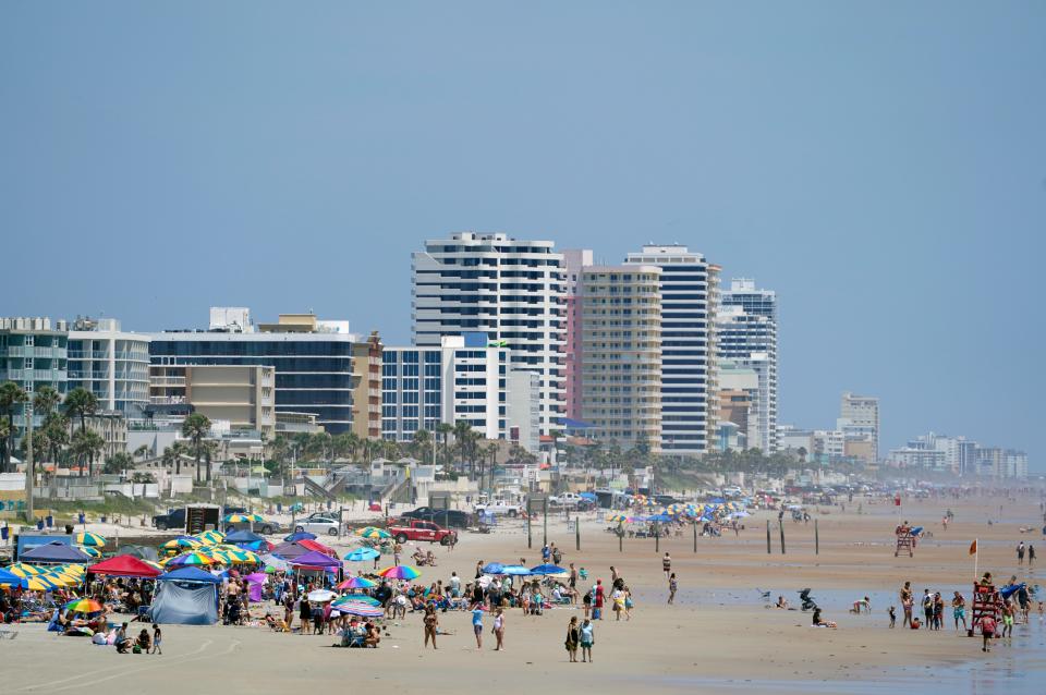 Beachgoers pack the shoreline along Daytona Beach. The Daytona Beach tourism board this week approved its proposed budget for the 2023-24 fiscal year, which includes money to expand the 'Beach On' marketing campaign.