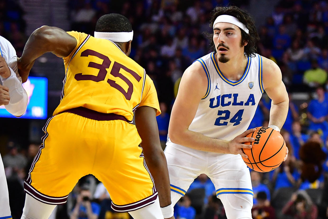 UCLA guard Jaime Jaquez Jr. controls the ball against Arizona State guard Devan Cambridge during the second half of their game on March 2, 2023, at Pauley Pavilion in Los Angeles. (Gary A. Vasquez/USA TODAY Sports)