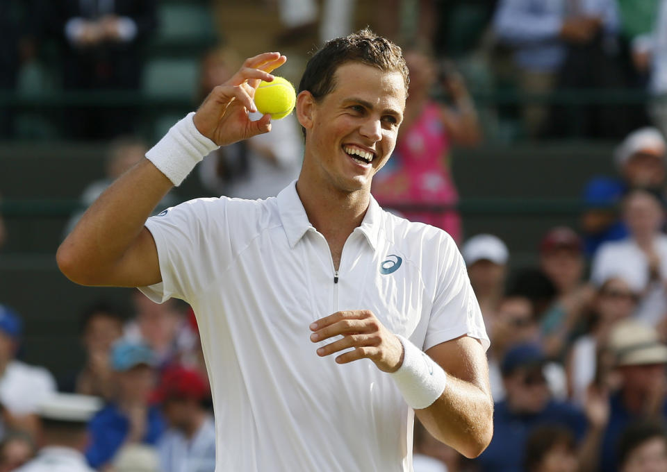 Vasek Pospisil of Canada celebrates after winning his match against James Ward of Britain at the Wimbledon Tennis Championships in London, July 4, 2015.                  REUTERS/Stefan Wermuth