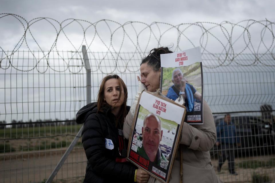 Maya Palty, left, comforts Efrat Machikawa, who both have relatives in Hamas captivity in the Gaza Strip (Copyright 2023 The Associated Press All rights reserved)