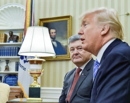 U.S. President Donald Trump meets with Ukraine's President Petro Poroshenko in the Oval Office at the White House in Washington, U.S., June 20, 2017. Mykola Lazarenko/Ukrainian Presidential Press Service/Handout via REUTERS