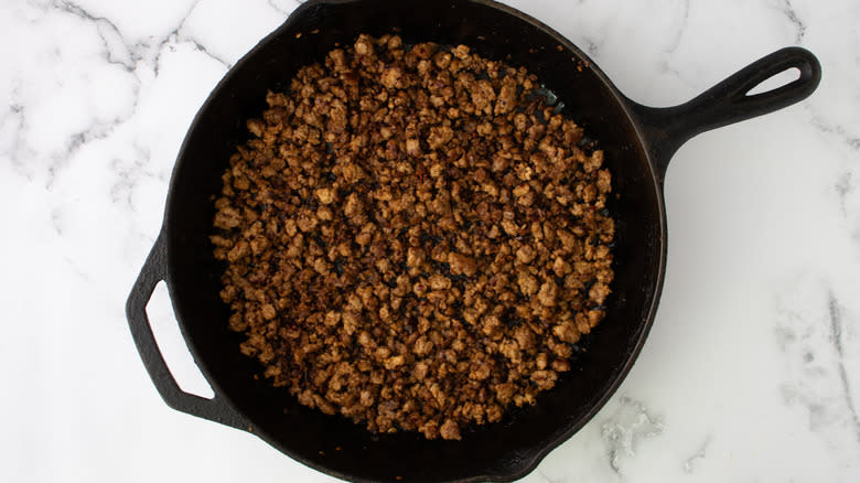 cooked ground meat in pan