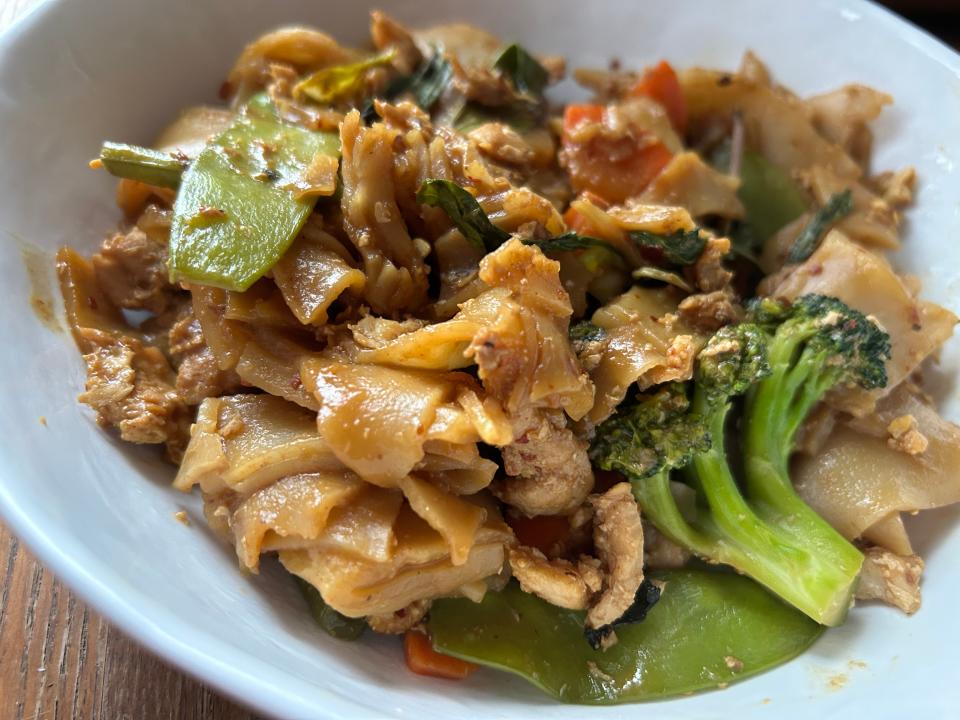 Kim's Thai serves up comforting pad kee mao with thick rice noodles, crisp-tender vegetables, savory chicken and a hint of spice.