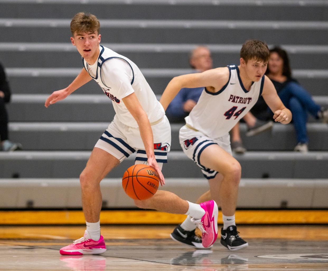 Heritage Hills High School junior Trent Sisley (40) looks up court after pulling down a rebound during the first half of a varsity game against Evansville Christian High School in the SNKRS4SANTA Shootout, Saturday, Dec. 2, 2023, at Brownsburg High School.