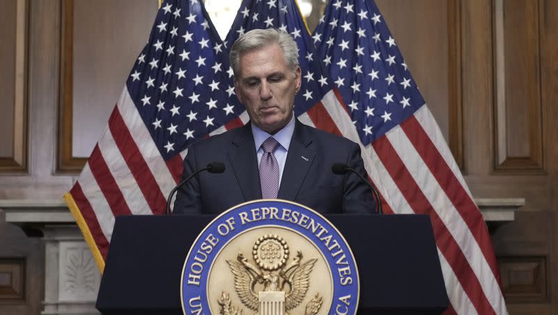 Rep. Kevin McCarthy, R-Calif., speaks to reporters hours after he was ousted as House speaker on Oct. 3, 2023, at the Capitol in Washington. McCarthy says he’s resigning from his congressional seat in California two months after his historic ouster as House speaker.