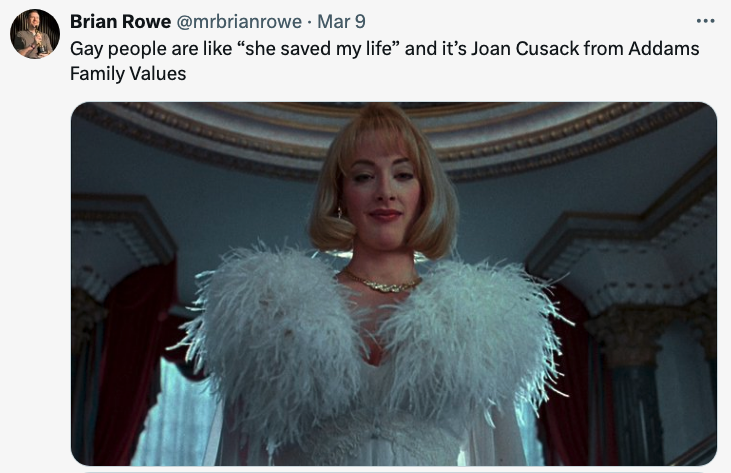 Joan Cusack as Debbie in "Addams Family Values" with a feather trim, caption references her character's impact