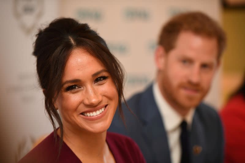 FILE PHOTO: Britain's Meghan, the Duchess of Sussex, and Prince Harry, Duke of Sussex, attend a roundtable discussion on gender equality with The Queen's Commonwealth Trust (QCT) and One Young World at Windsor Castle