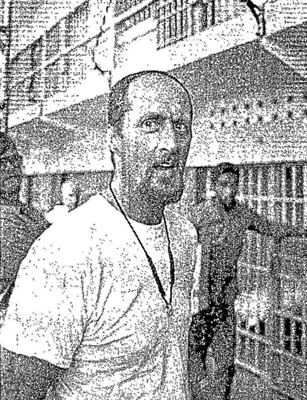 Gene Travis is photographed as an inmate at the ACI in Cranston, R.I., in 1979, where he was serving time.