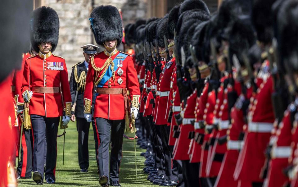 Prince William inspected the front rank of the Irish Guards alongsude the Commanding Officer and Equerry - RICHARD POHLE 