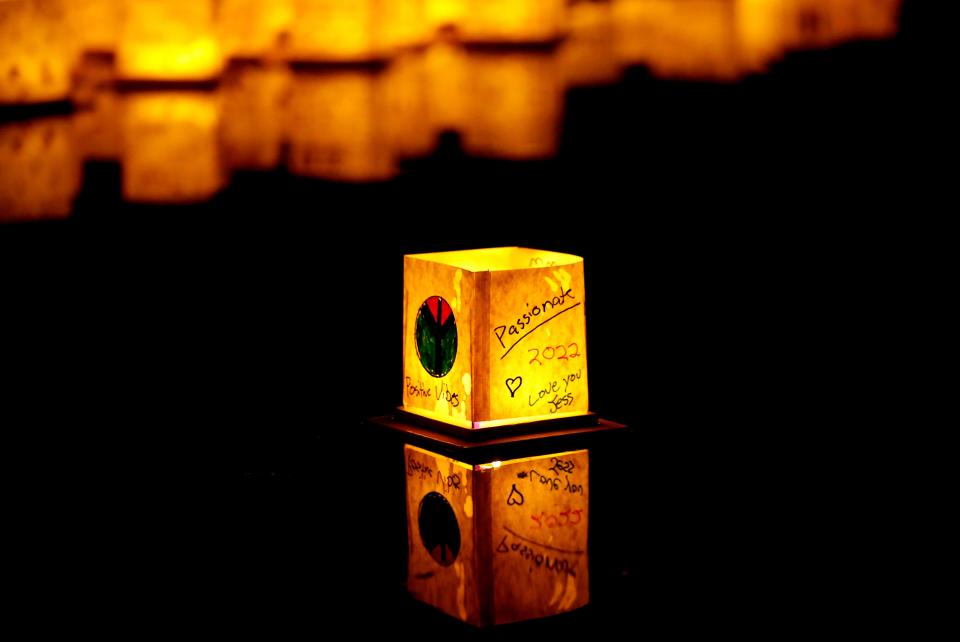 A lantern floats in the water during a the Water Lantern Festival at Hafer Park in Edmond, Okla., Saturday, Aug., 20, 2022. 