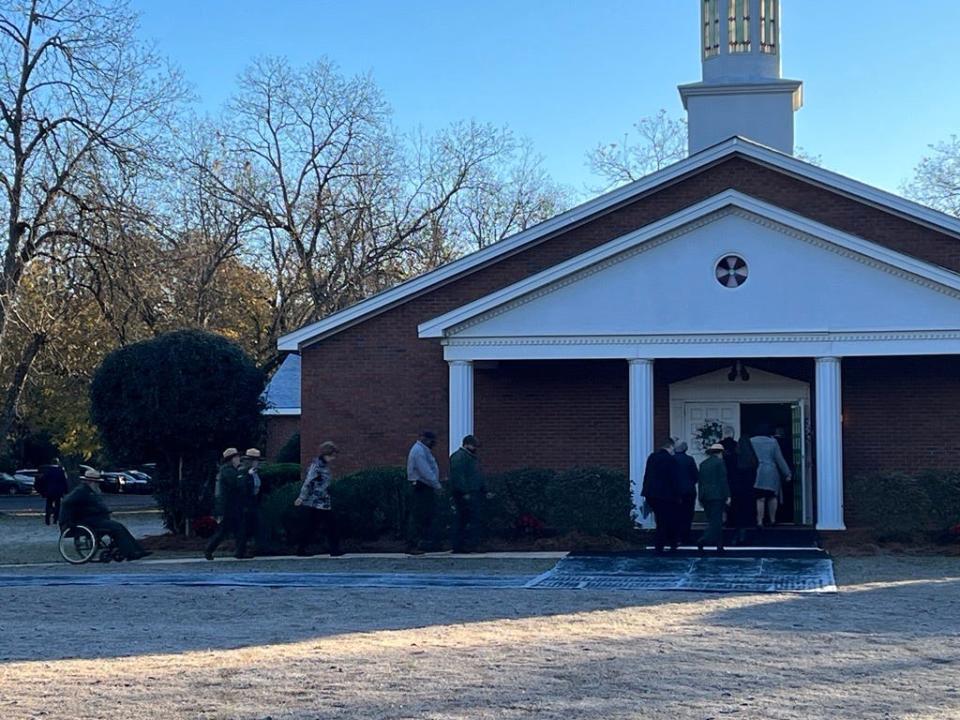 Guests begin to arrive at Maranatha Baptist Church in Plains, Ga. ahead of a funeral service for former first lady Rosalynn Carter.