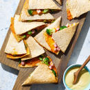 <p>Lightly charred garlicky broccoli and Cheddar make a delicious filling for these air-fryer quesadillas that both kids and adults will love. If you like, include cubes of ham in the quesadillas. A quick honey-mustard dipping sauce provides a hint of sweetness. <a href="https://www.eatingwell.com/recipe/8022721/air-fryer-broccoli-cheddar-quesadillas/" rel="nofollow noopener" target="_blank" data-ylk="slk:View Recipe;elm:context_link;itc:0;sec:content-canvas" class="link ">View Recipe</a></p>