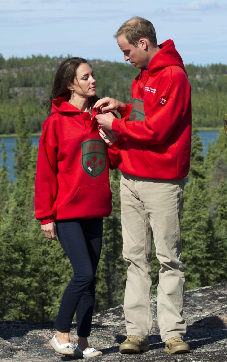 <p>Wearing matching Canadian Rangers sweaters, after being made honourary members, the couple looked more comfortable than ever before during this photocall. <br><em>[Photo: PA]</em> </p>