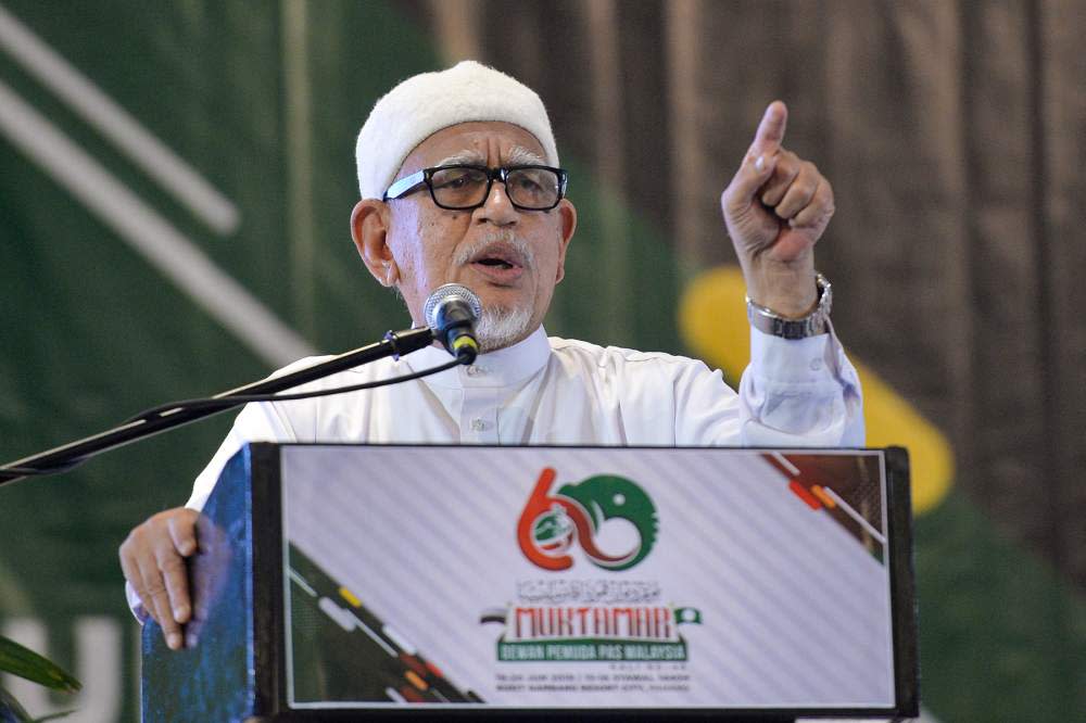 PAS President Datuk Seri Abdul Hadi Awang speaks during the Dewan Pemuda PAS Muktamar in Gambang, Pahang June 20, 2019. ― Picture by Mukhriz Hazim