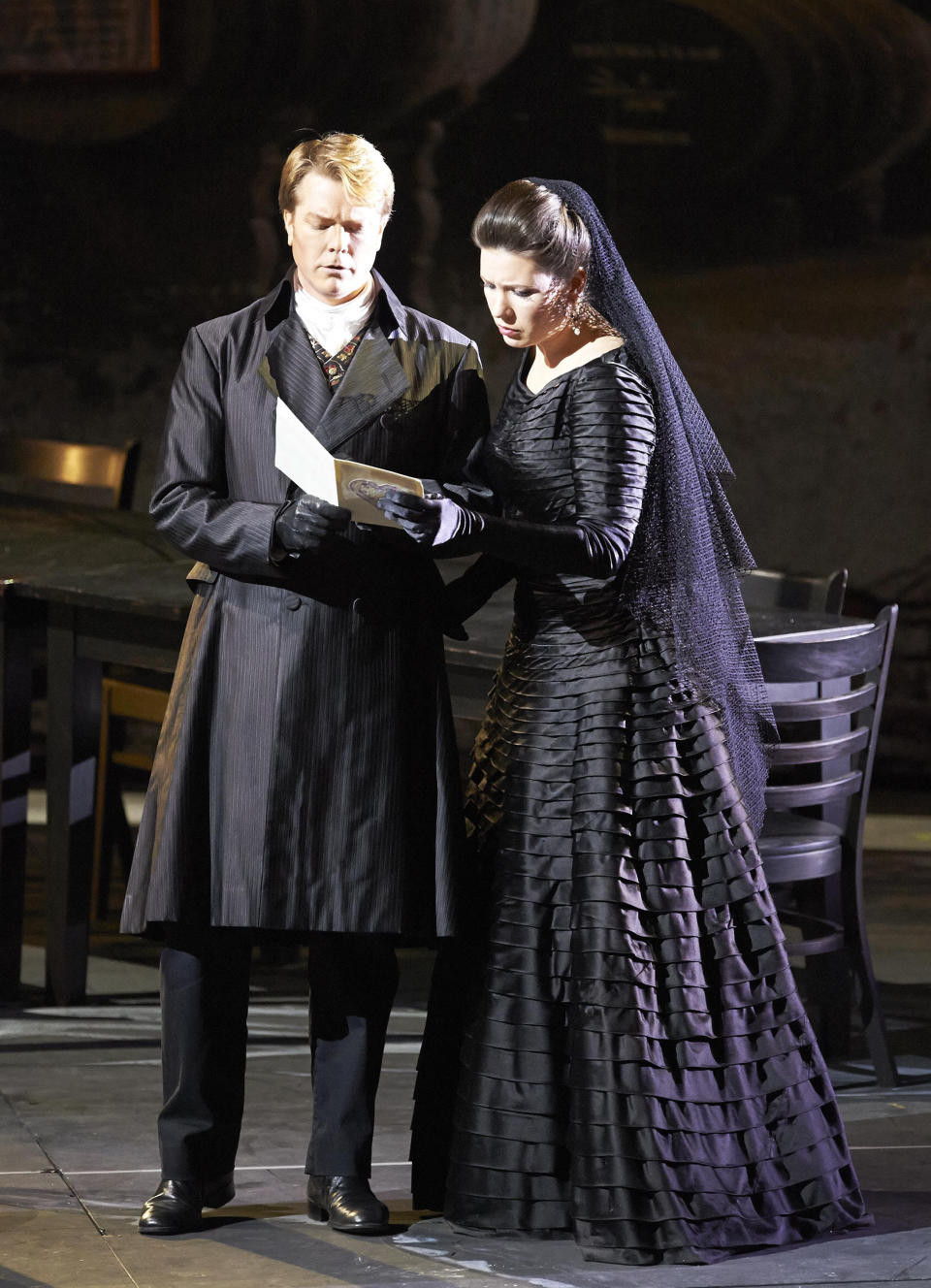 In this March 2, 2013 photo provided by the Vienna State Opera Toby Spence in the role of Don Ottavio and Marina Rebeka as Donna Anna perform during a dress rehearsal for Wolfgang Amadeus Mozart's opera "Don Giovanni" at the state opera in Vienna, Austria. (AP Photo/Vienna State Opera, Michael Poehn)
