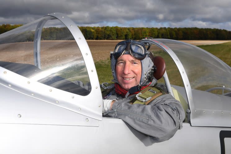 Alan James in his home-built Spitfire (Picture: SWNS)