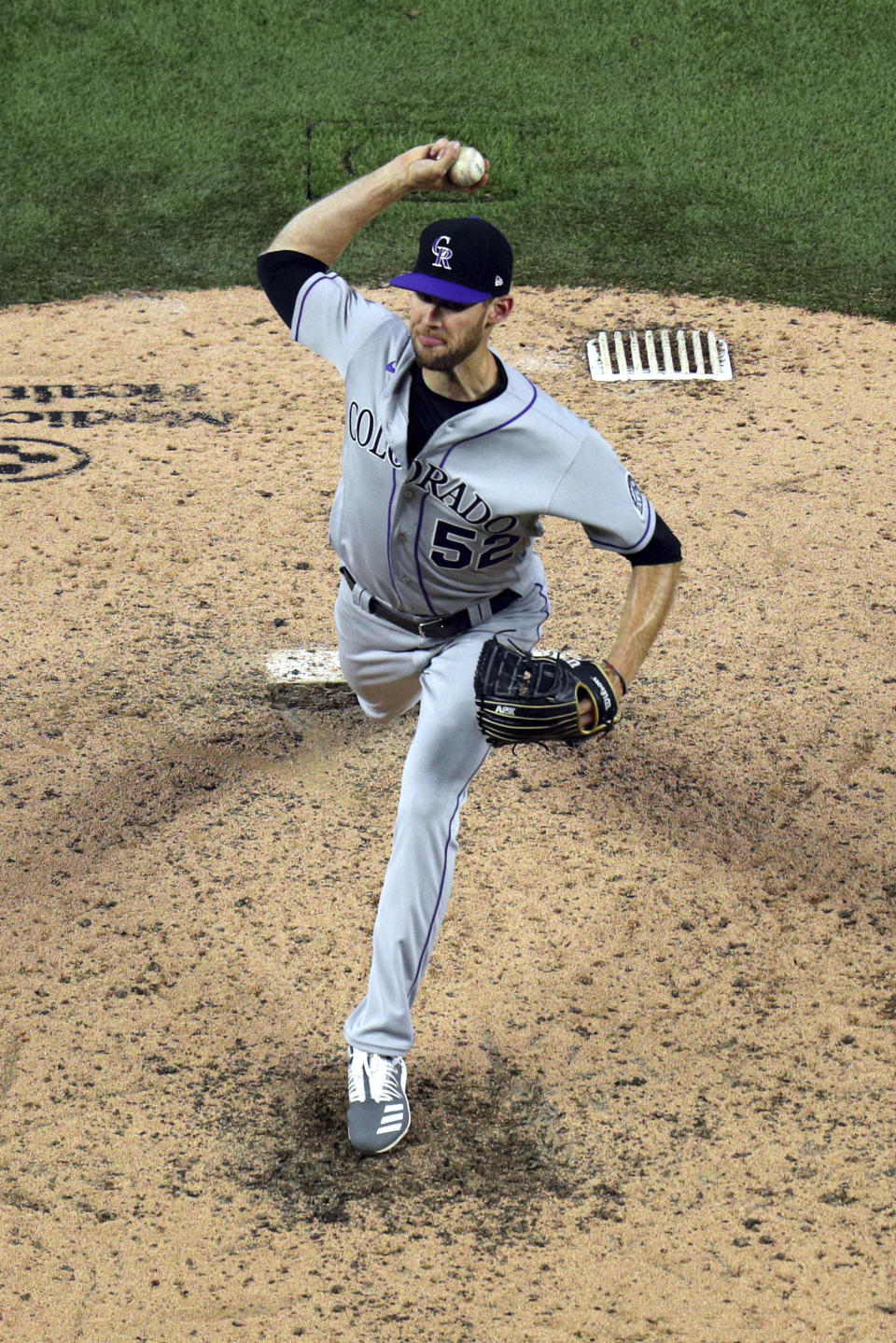 Colorado Rockies pitcher Daniel Bard throws in the fifth inning against the Texas Rangers in a baseball game Saturday, July 25, 2020, in Arlington, Texas. (AP Photo/Richard W. Rodriguez)