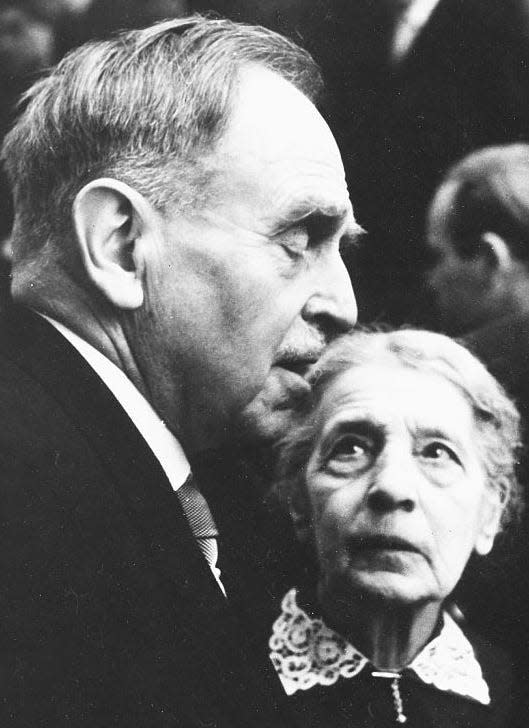 Lise Meitner looks at Otto Hahn.