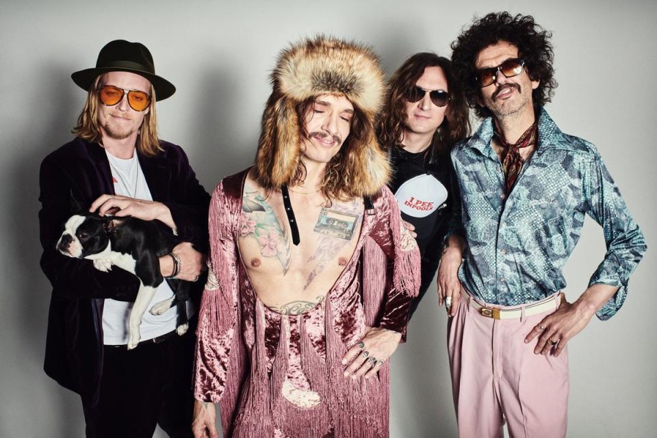 Justin Hawkins (furry hat): ‘My brother said “let’s do a Christmas song” and the label were like, “OK!”' (Press image)