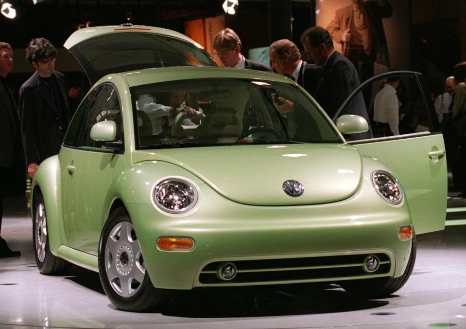 A lime green VW Beetle on display