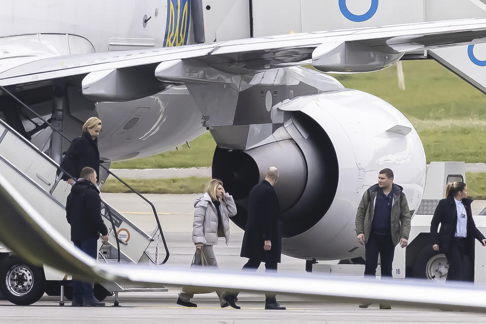 First Lady of Ukraine Olena Zelenska, center, arrives at the airport in Zurich, Switzerland, on Monday, January 16, 2023. First Lady Zelenska is expected to attend the 52nd annual meeting of the World Economic Forum, WEF, in Davos, Switzerland. (Michael Buholzer/Keystone via AP)