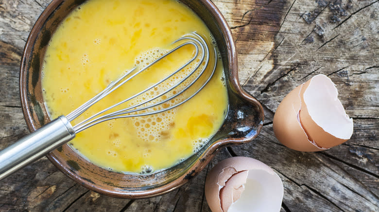 Whisking eggs for soup