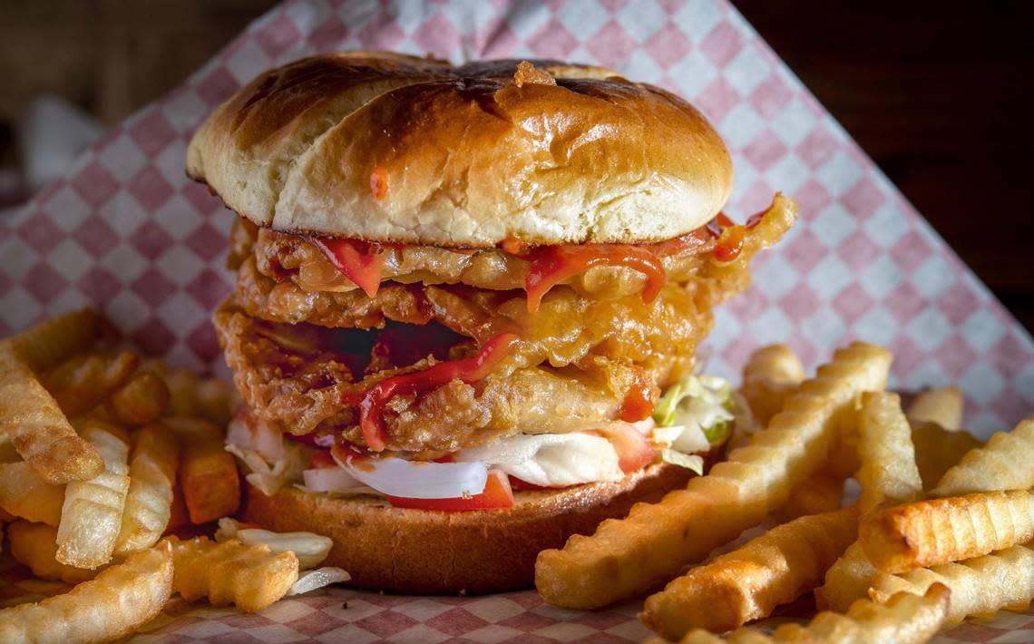 The pork tenderloin sandwich and fries from Kitty’s Cafe, 810 1/2 E. 31st St., in operation since 1951.