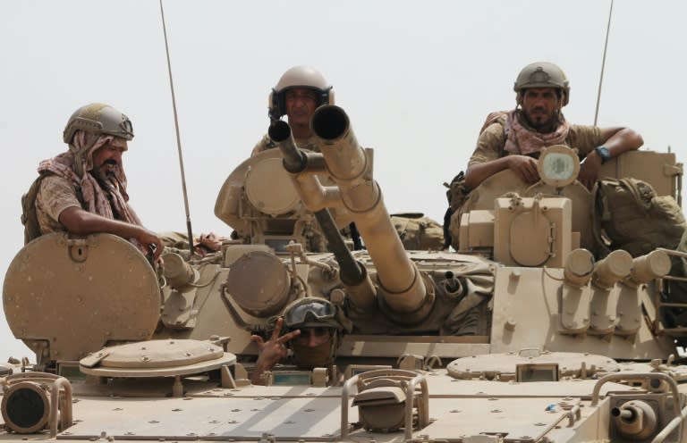 Soldiers pictured on a Saudi-led coalition tank deployed on the outskirts of the southern Yemeni port city of Aden on August 3, 2015, during a military operation against Shiite Huthi rebels and their allies