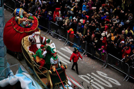 A Santa Claus makes its way down 6th Avenue during the 90th Macy's Thanksgiving Day Parade in the Manhattan borough of New York, U.S. November 24, 2016. REUTERS/Saul Martinez