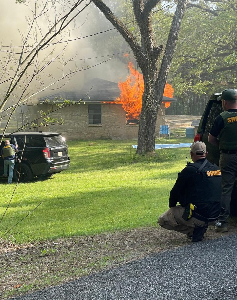 After a house fire and exchange of gunfire in Carthage, Miss. between a barricaded person believed to be Hinds County escapee Dylan Arrington and multiple law enforcement agencies, an unidentified body was located in the burned residence.