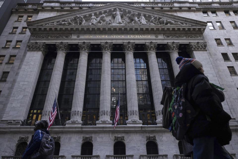 People walking outside the New York Stock Exchange.