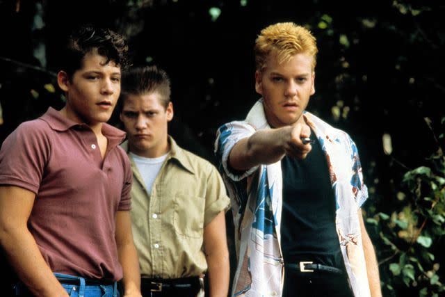 <p>Moviestore/Shutterstock</p> Kiefer Sutherland (right) in "Stand By Me" (1986)