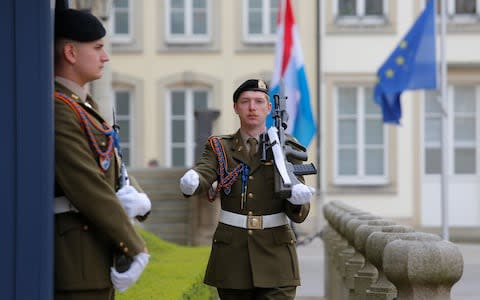 A guard walks in front of The Grand Ducal Palace in Luxembourg, 23 April 2019 - Credit: Rex