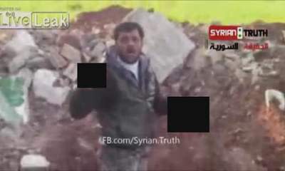 Syrian Rebel 'Cuts Out Soldier's Heart'