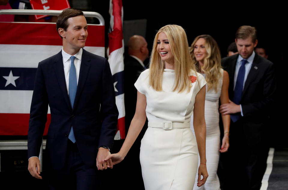 White House senior advisors Ivanka Trump and Jared Kushner react as U.S. President Donald Trump formally kicks off his re-election bid with a campaign rally in Orlando, Florida, U.S., June 18, 2019.  REUTERS/Carlos Barria     TPX IMAGES OF THE DAY